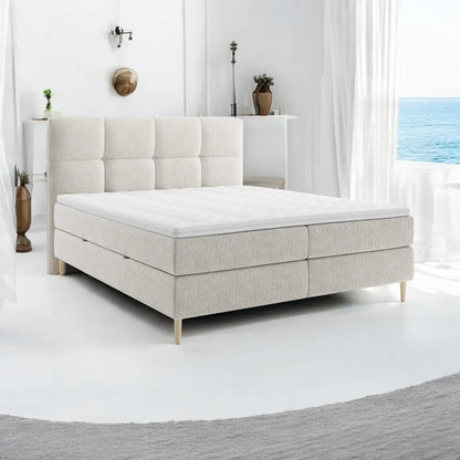 Lit BOXSPRING LEO - Avec tête de lit, coffre intégré, matelas ressorts ensachés et surmatelas inclus