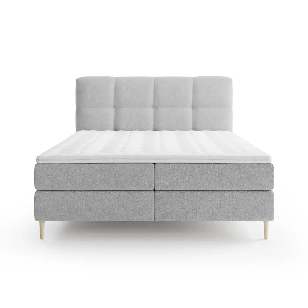 Lit BOXSPRING LEO - Avec tête de lit, coffre intégré, matelas ressorts ensachés et surmatelas inclus