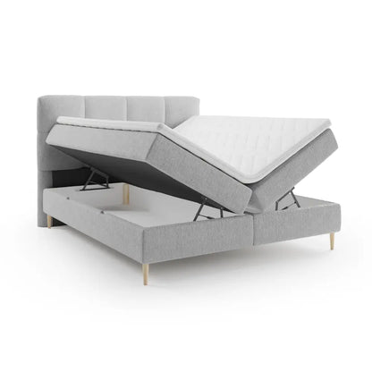 Lit BOXSPRING LEO - Avec tête de lit, coffre intégré, matelas ressorts ensachés et surmatelas inclus