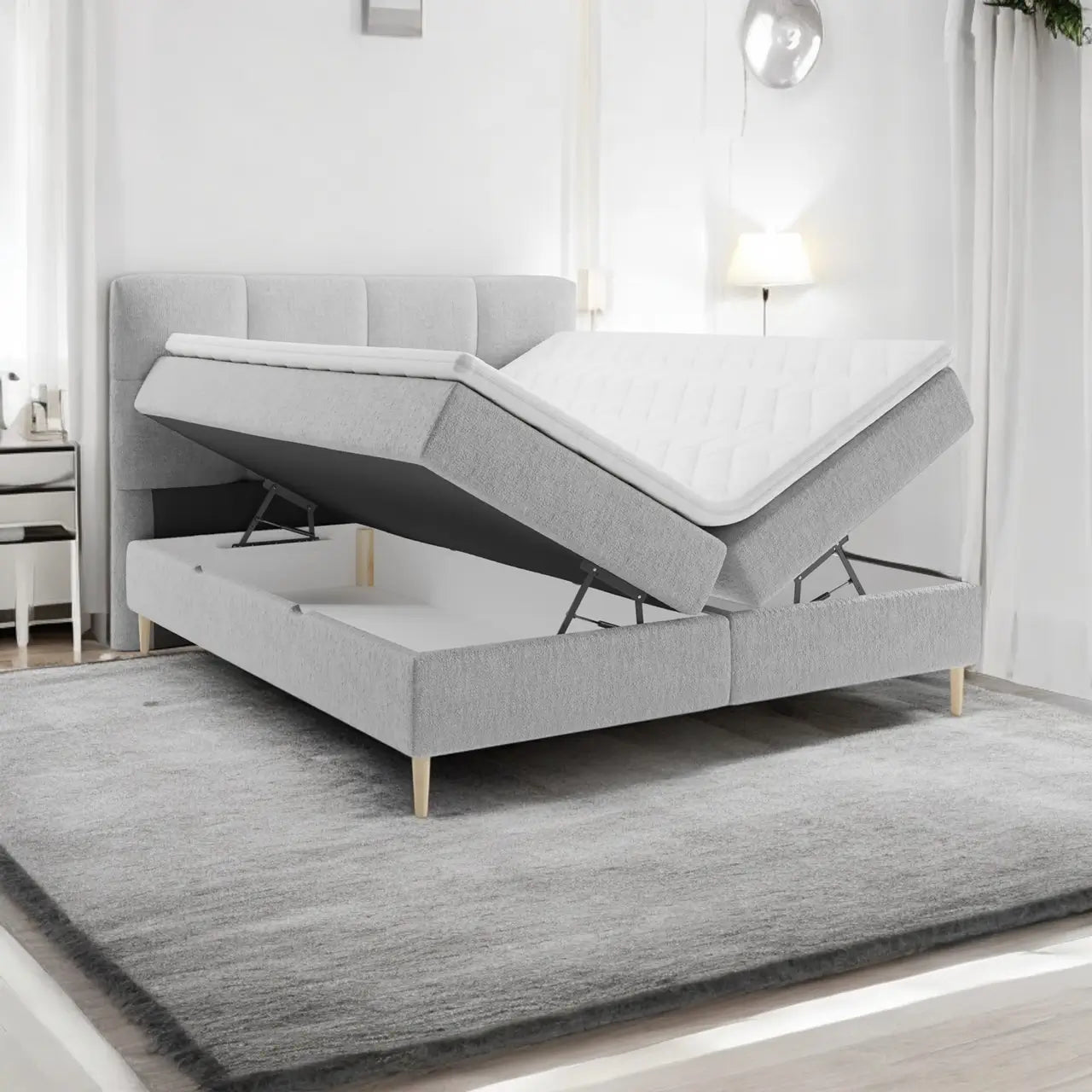 Lit BOXSPRING LEO - Avec tête de lit, coffre intégré, matelas ressorts ensachés et surmatelas inclus